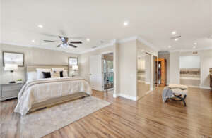 Bedroom with Wooden Floor and White Ceiling
