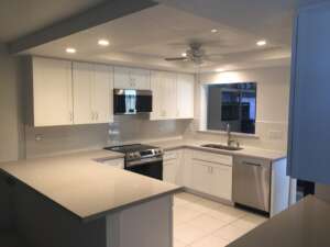 Kitchen with white flooring